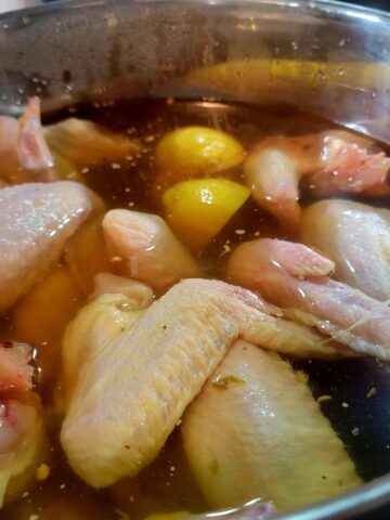 chicken wings shown in brine