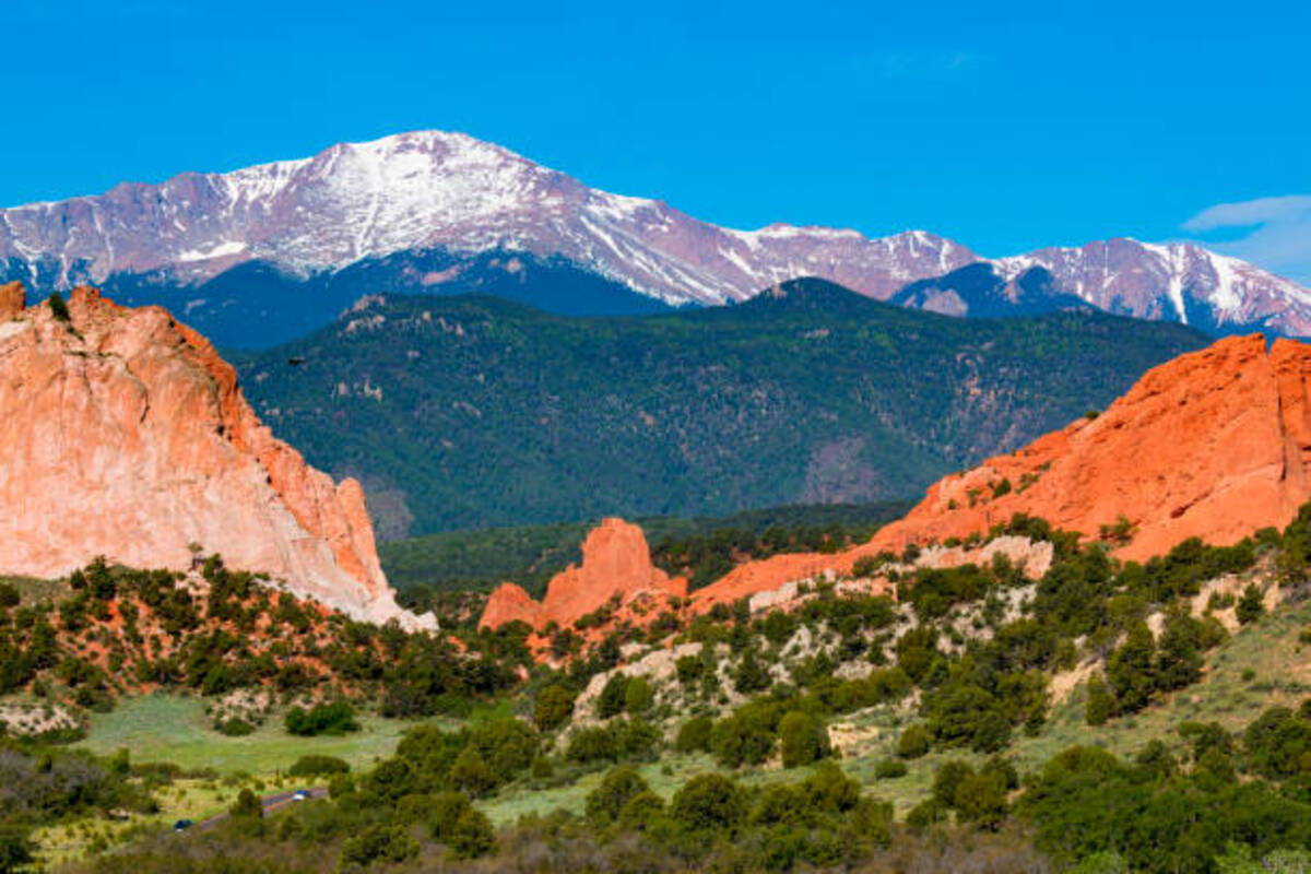 landscape photo of garden of the gods park with pikes peak mountain in background