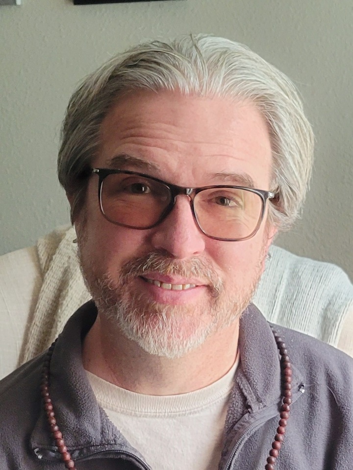 face of Jason Miller, smiling