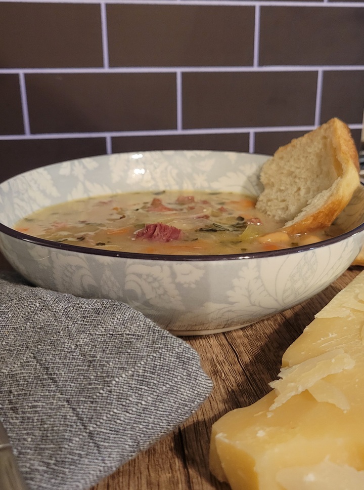 finished white bean and ham soup with bread