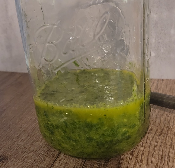 finished chimichurri in mason jar