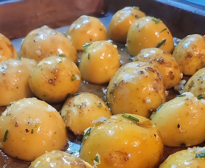 potatoes placed on sheet pan with cut side down